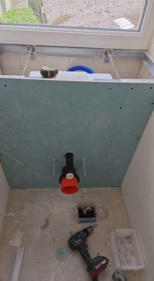 Salle de bain en travaux et terminée